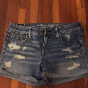 Distressed medium wash jean shorts